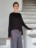 asymmetrical lightweight rayon jersey black long sleeve top #color_black