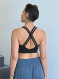 caraucci stretchy full coverage black yoga bra top with criss cross back straps #color_black