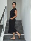 caraucci loose fit black cotton dress with pockets #color_black