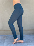 women's teal bamboo spandex pants with raised stitch details and 2 zipper pockets #color_teal