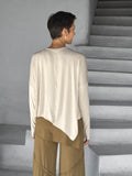 asymmetrical lightweight rayon jersey cream long sleeve top #color_cream