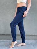 women's bamboo spandex navy blue jogger pants with two front pockets #color_navy