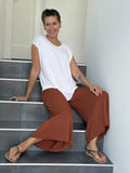 caraucci women's burnt orange wide leg cropped flare pants #color_copper