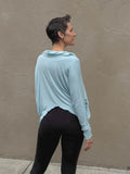 women's natural lightweight rayon jersey cowl neck sky blue loose fit top with thumbholes #color_canal-blue