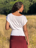 women's lightweight plant based rayon jersey white top with smocked waist band and cap sleeves #color_white