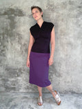 caraucci stretchy plant-based purple a line midi skirt #color_plum