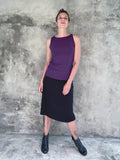 caraucci stretchy plant-based black rayon lycra a line midi skirt #color_black
