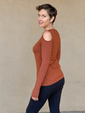 women's plant based stretchy rayon jersey long sleeve peekaboo shoulder burnt orange top with thumbholes #color_copper